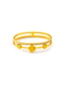 Detailed macro view of 18k gold plated clover bracelet with sparkling zircon stones - 18K Gold / Gold