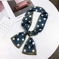 Navy blue polka dot long skinny scarf with olive green borders on a white table - Blue Polka Dots