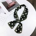 Elegant dark green silk scarf with white polka dots tied in a stylish bow knot - Polka Dot Green