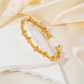 Brazalete abierto de acero inoxidable chapado en oro de 18k con diseño de alambre fino - Estilo de Alambre de Púas Dorado (szkk085g)