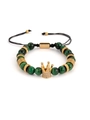 Detail of adjustable green stone bracelet with golden crown and braided black cord - Green Malachite Texture Stone (slbz019 Green)
