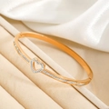 Bracelet coeur en acier inoxydable plaqué or 18k avec accents de zircone scintillants - Or rose