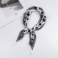 Elegante sciarpa in seta a pois bianchi e neri con bordi geometrici a righe - Bianco