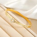 Brazalete de estrella en acero inoxidable bañado en oro 18k con circones brillantes - Dorado