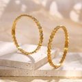 Golden honeycomb hexagon bangle set with cubic zirconia in a stacked vintage style - Honeycomb Bee My Love Style (sztx109)