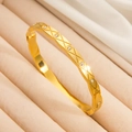 Bracciale rigido dorato in acciaio al titanio con motivo trapuntato e zirconi su velluto - Oro