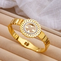 Macro shot of 18k gold plated sunburst bangle with zircons on a beige velvet box - Gear Sun Flower Style (sztx233g)