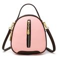 Pink lychee grain bucket bag with dark brown trim and vertical gold zipper details - Pink