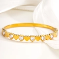 Elegant gold heart bracelet with alternating diamonds on a white silk background - Solid And Rhinestone Heart Alternate Style (044)