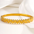 Luxurious gold heart-shaped bangle with sparkling diamond accents on soft satin background - Double Layer Staggered Heart Style (019)