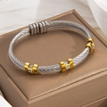 Zweifarbiges gedrehtes Kabelarmband in Gold und Silber mit funkelnden Strasssteinen - Zweifarbig (Gold & Silber)