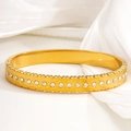 Golden heart-embossed titanium steel bangle with sparkling crystals on silk - Heart Embossed Rhinestone Style (102)