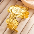 Vintage floral relief gold titanium steel open bangle with adjustable flower pattern - Gold