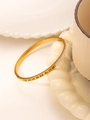 Gold-plated stainless steel bangle with roman numerals and inlaid cubic zirconia crystals - 157 Gold