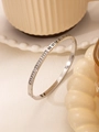 Silver roman numeral bangle with square zircon stones on a white textured surface - 157 Silver