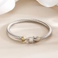 Zilveren kabelarmband met gouden hoefijzersluiting in een luxe maritieme stijl - Tweekleurig (Goud & Zilver)