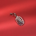 Close-up of a silver hollow 304 stainless steel keychain featuring a Chinese character charm - Wealth