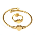 18K vergoldetes Herz-Schmuckset bestehend aus gedrehtem Kabelarmband und passendem Ring - Gold