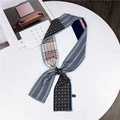 Long silk scarf with blue-grey stripes and orange-blue plaid pattern tied in a knot - Floral Stripe Royal Blue