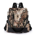 Floral tapestry nylon backpack with black leather trim and vertical zipper detail - Brown