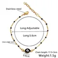 Detailansicht des 18K Gold Evil Eye Armbands mit Maßen und verstellbarem Verschluss - Schwarz