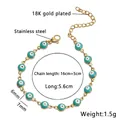 Bracelet œil maléfique en acier inoxydable plaqué or 18 carats et émail bleu - Rond / Vert