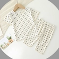 Beige polka dot toddler pajama set with ruffled short sleeves and long pants - 80cm / Apricot