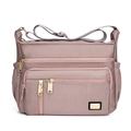 Lotus pink oxford cloth shoulder bag with multiple zippered pockets and gold hardware - Lotus Pink