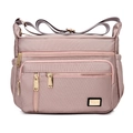 Waterproof lotus pink nylon shoulder bag with multi-pocket design and golden hardware - Light Pink