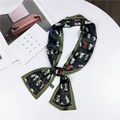 Dark green silk-like twilly scarf featuring colorful cat prints tied in a bow - Dark Green Cat (16)