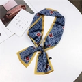 Navy blue twilly scarf with geometric patterns and orange clover accents on white table - Blue Yellow Coin Flower (28)