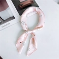 Pink silk neckerchief with black and white swan pattern and elegant knotted styling - Pink Swan