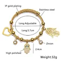 Goldenes IP-Edelstahlarmband mit Hamsa- und Herzanhängern und weißen Zirkonia-Steinen - 18K Gold / Gold