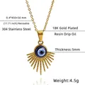 Detail van de 18K vergulde roestvrijstalen Evil Eye hanger met blauwe hars inlegwerk - hanger ketting