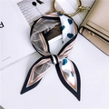 Elegant heart and plaid print silk scarf tied as a bow on a beige handbag - Blue Heart