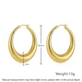 Detail view of large gold hollow hoop earrings with dimensions 39mm height and 8mm width - 39mm x 8mm