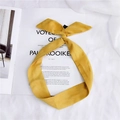 Bandeau en suédine jaune gingembre doté d'un design élégant de nœud papillon - Jaune