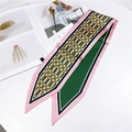 Pink and green plaid twilly scarf with satin finish on white marble surface - Colorful Grid Green