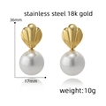 Detail view of 18k gold shell earrings with dimensions 36mm by 17mm and 10g weight - Large Pearl Style