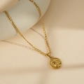 Gold stainless steel Figaro chain necklace featuring a round Leo lion relief pendant - Leo