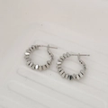 Detailed close-up of silver-tone hoop earrings with a beaded chain link design - Silver