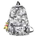 Schulrucksack mit Schwarz-Weiß-Manga-Druck und grünem Dinosaurier-Anhänger-Detail - Schwarz