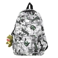Moderner Rucksack mit schwarz-weißen Comic-Prints und grünem Dinosaurier-Plüsch-Anhänger - Grün