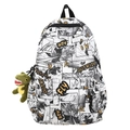 Moderner Rucksack mit Schwarz-Weiß-Manga-Druck und kleinem grünen Dino-Anhänger - Gelb
