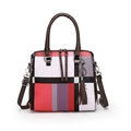 Vintage color-block handbag in patchwork style with top handles and tassel charm - Red