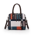 Retro plaid crossbody bag featuring orange and navy contrast panels with cat charm - Green