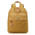 Waterproof mustard yellow nylon backpack for women featuring top handles and metal logo - Dark Gold