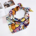 Colorful geometric silk scarf in yellow and purple tied in a knot on a magazine - 70cm / Colorful Floral Leaves