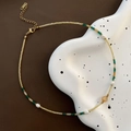 Elegant emerald and pearl beaded necklace with K18 gold clasp on a ceramic tray - Amber Stone Pale Yellow Faceted Bead Style (74#XK)