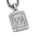 Polished stainless steel pendant featuring engraved letter M with industrial radial texture - Steel M